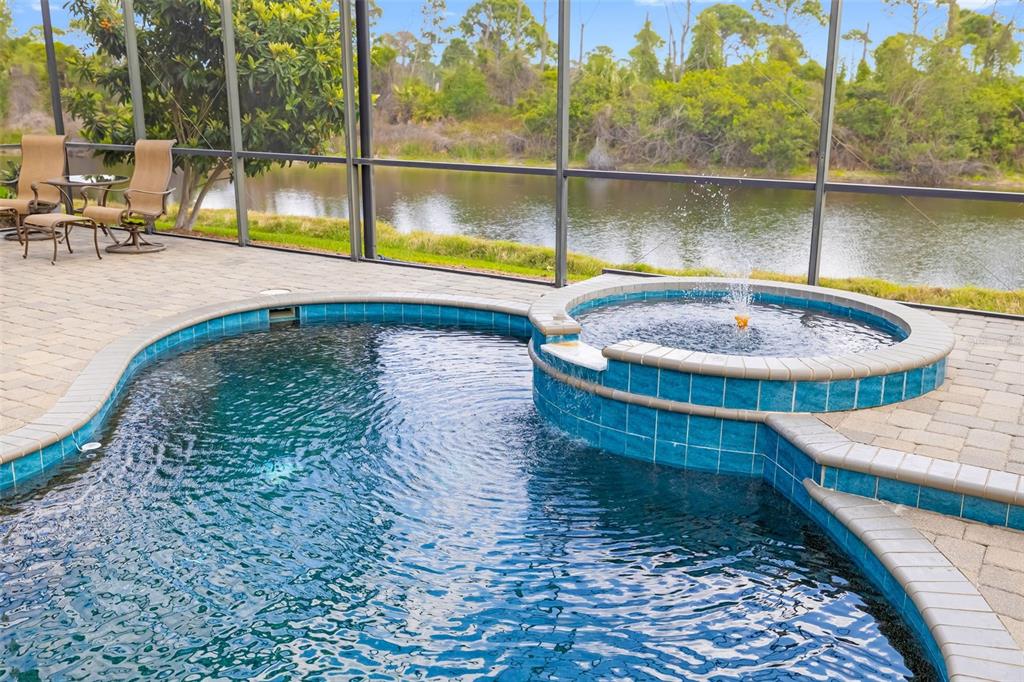 1016 Scherer Way Osprey, FL 34229 - Photo 62 of 76 swimming pool view with a lake view