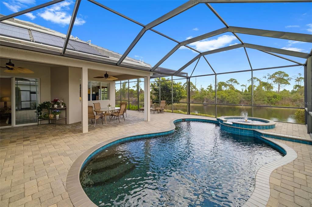 1016 Scherer Way Osprey, FL 34229 - Photo 63 of 76 a view of swimming pool with seating area