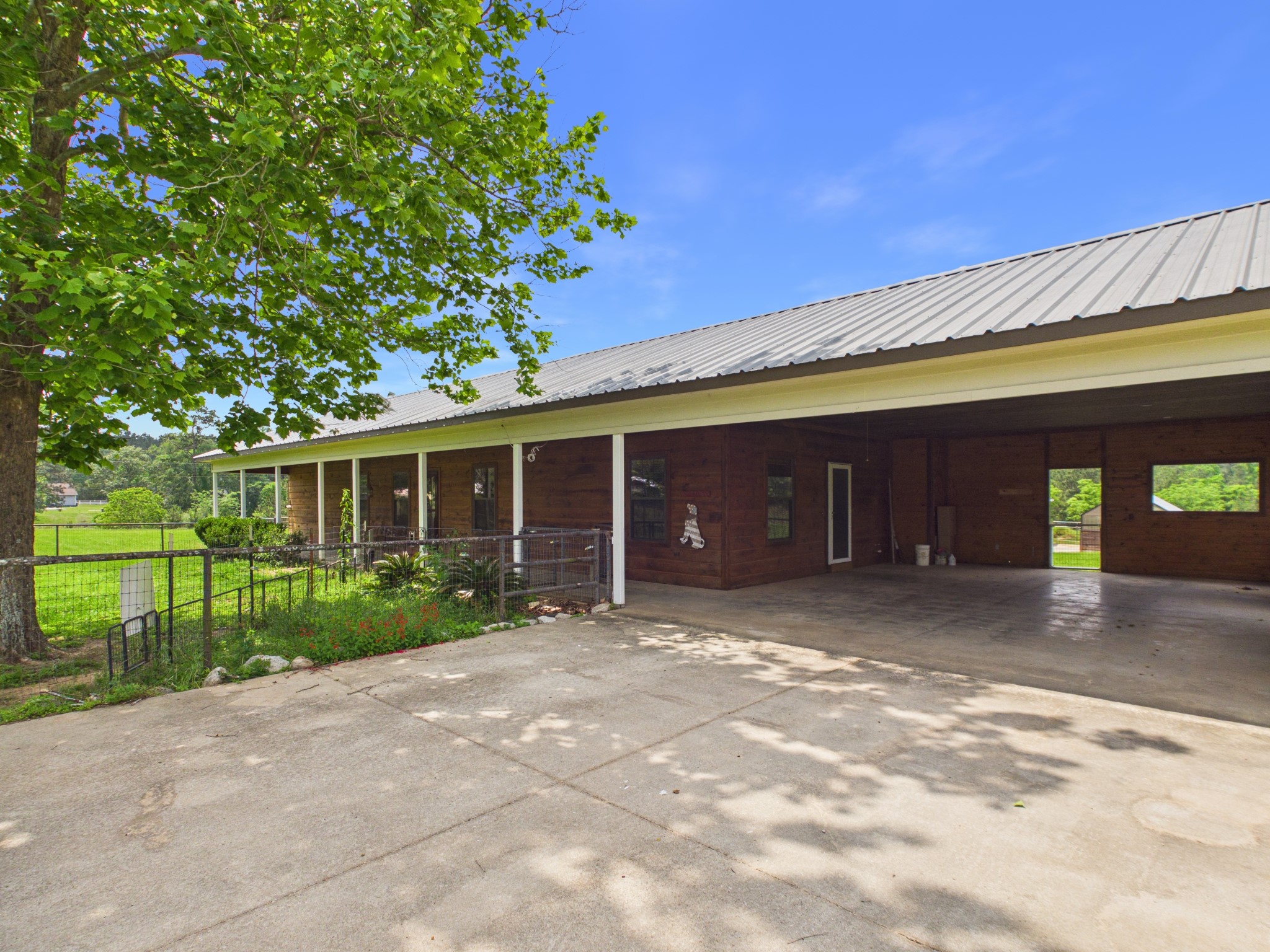 160 Vida Lane Coldspring, TX 77331 - Photo 22 of 23 Covered parking.