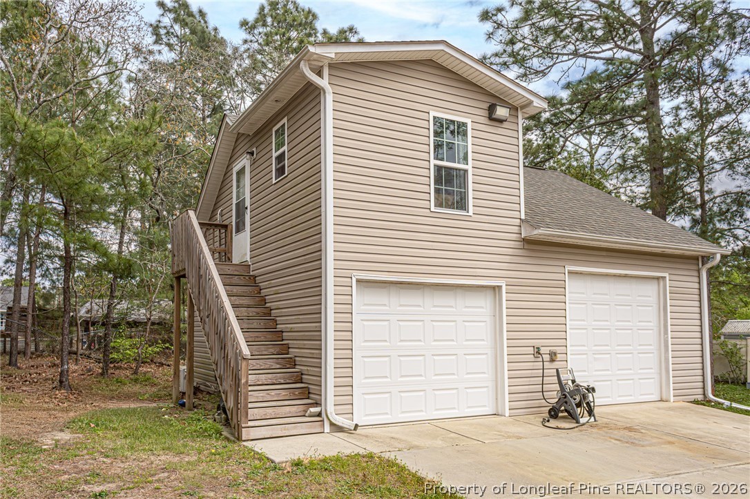 126 West 12 Oaks Road Raeford, NC 28376 - Photo 3 of 49 Detached 2 Car Garage with Room and Full Bath