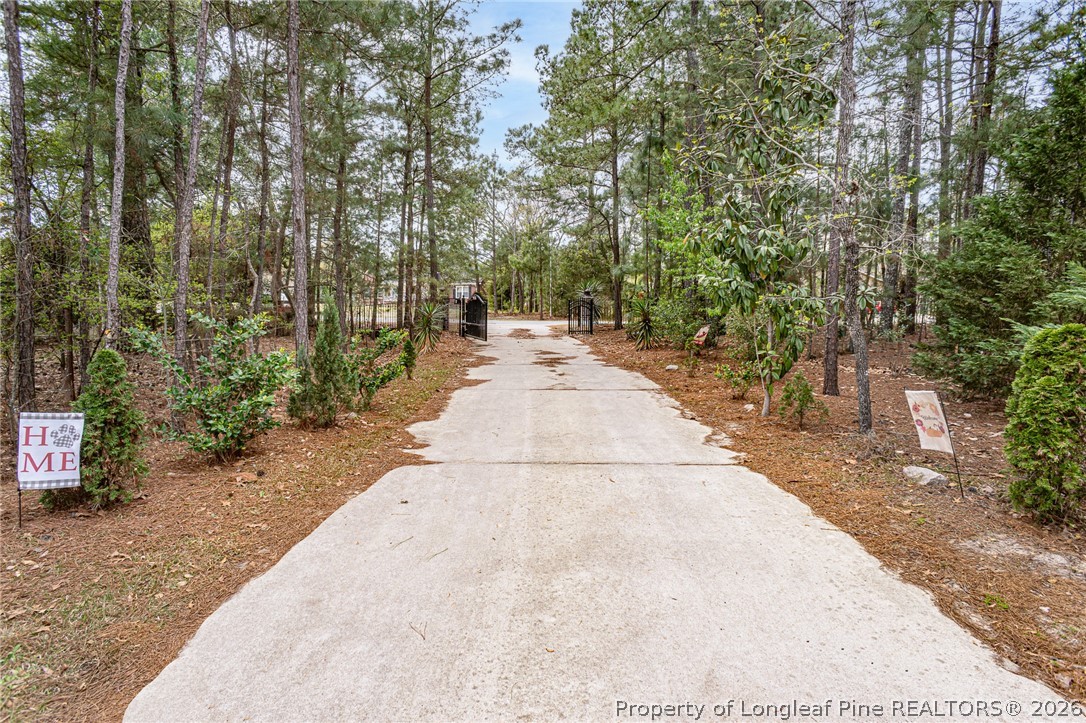 126 West 12 Oaks Road Raeford, NC 28376 - Photo 5 of 49 Private, fenced yard
