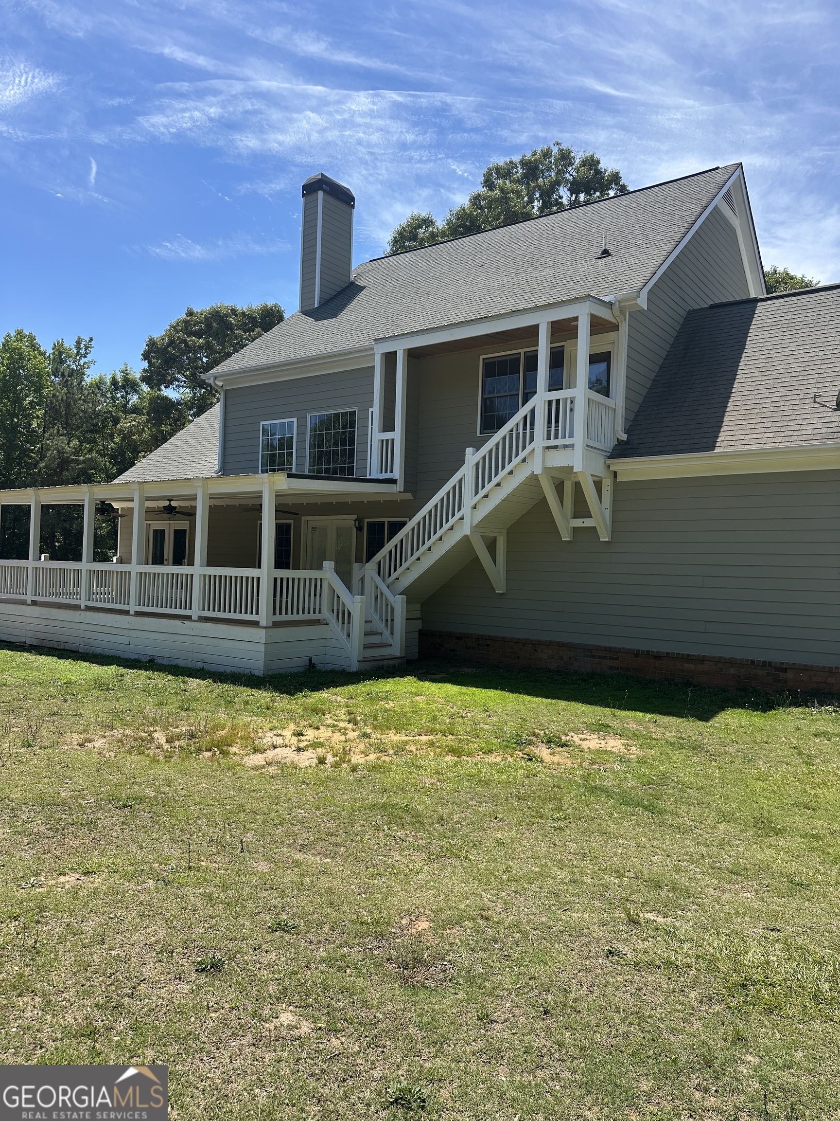 65 Spratlin Way Hull, GA 30646 - Photo 8 of 35 a view of a house with a backyard