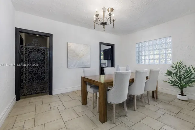 a view of a dining room with furniture