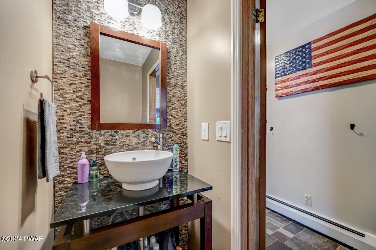 19 Ripple Lane Beach Lake, PA 18405 - Photo 25 of 52 a bathroom with a sink and a mirror