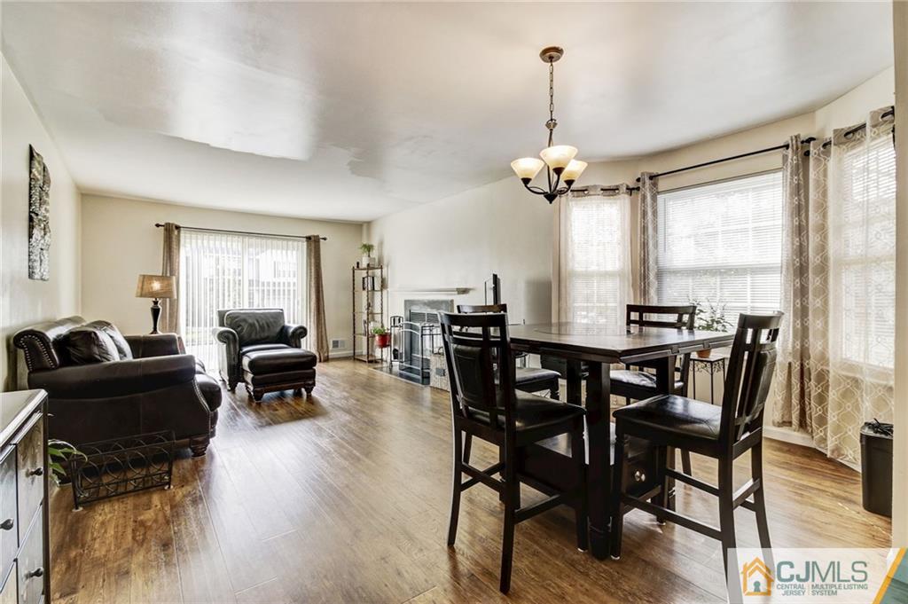 601 Porter Way West Bridgewater, NJ 08807 - Photo 2 of 15 a view of a dining room with furniture window and wooden floor