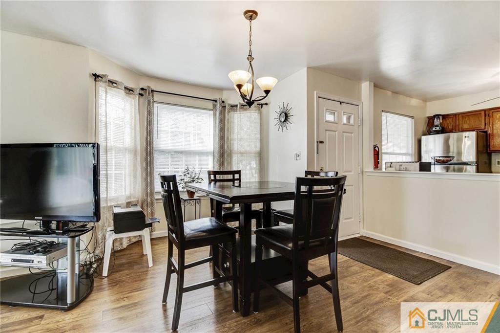 601 Porter Way West Bridgewater, NJ 08807 - Photo 3 of 15 a view of a dining room with furniture window and wooden floor