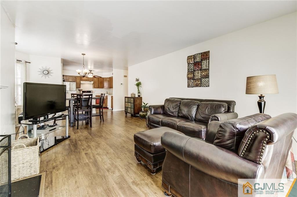 601 Porter Way West Bridgewater, NJ 08807 - Photo 6 of 15 a living room with furniture and a flat screen tv