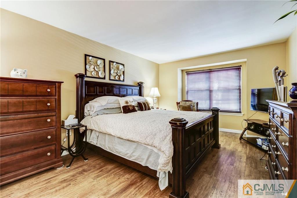 601 Porter Way West Bridgewater, NJ 08807 - Photo 8 of 15 a bed room with a bed and a television