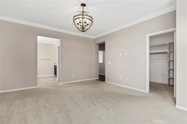 an empty room with a hallway