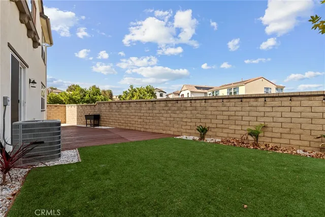 a view of a terrace with yard