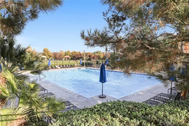 a sign board with yard in back