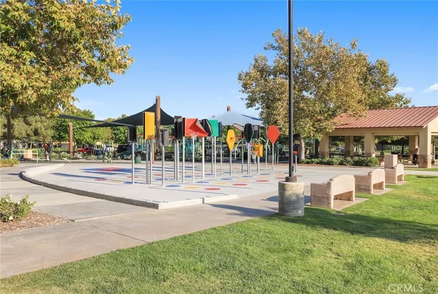a view of street with houses and trees