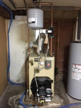 6 Rindone Street Holbrook, MA 02343 - Photo 17 of 18 a room with water heater and storage
