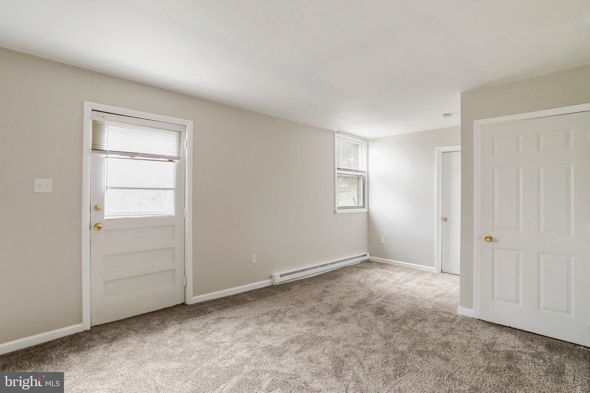 30 East E Street Brunswick, MD 21716 - Photo 23 of 33 Lower Level Living Room , right side