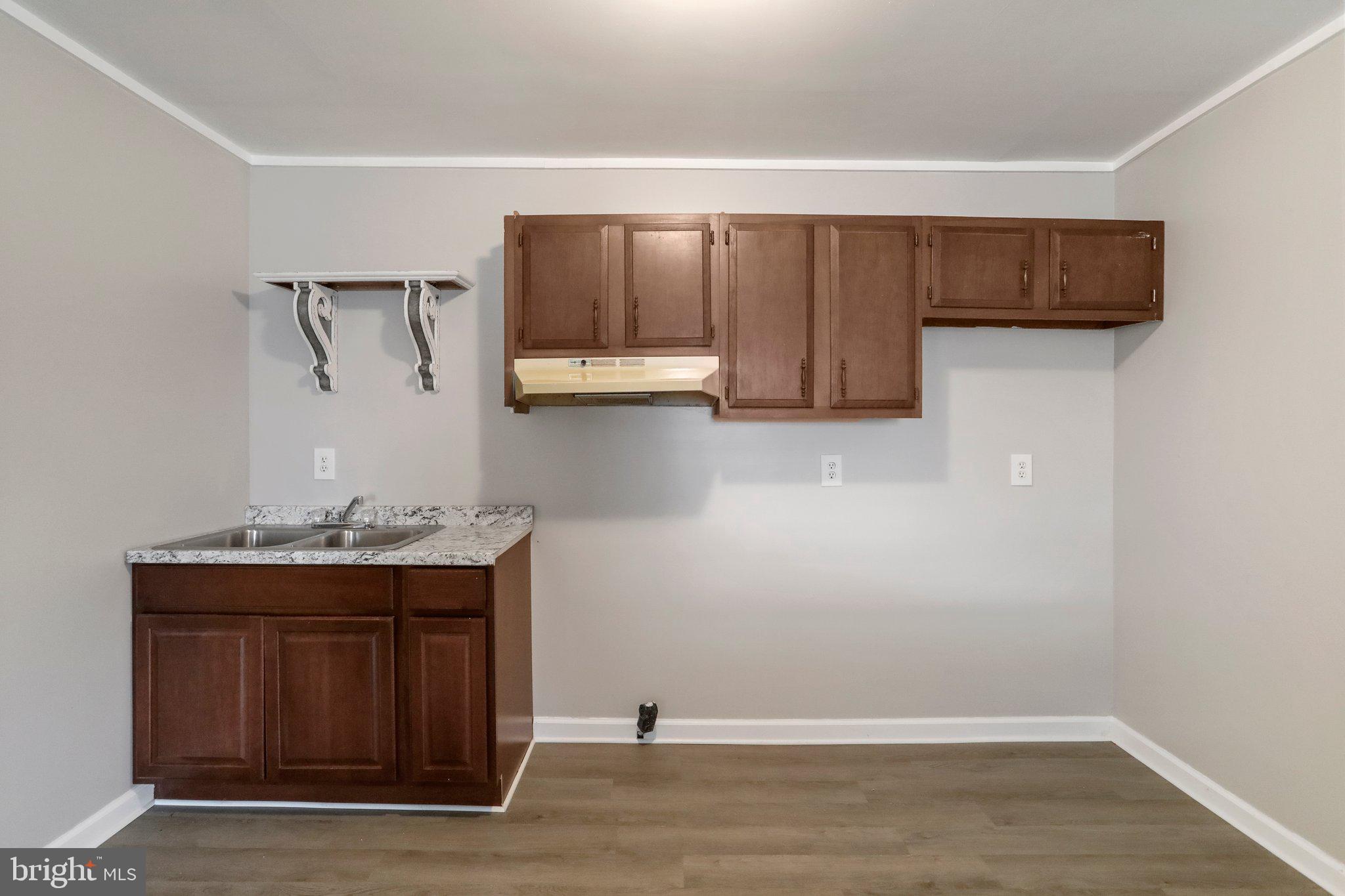 30 East E Street Brunswick, MD 21716 - Photo 28 of 33 Lower Level Wet Bar/Kitchen