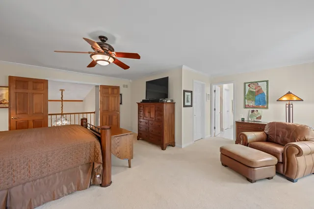 a bedroom with a bed and furniture