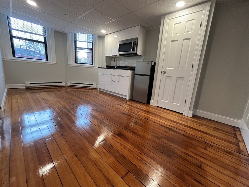 506 Beacon Street, Unit C Boston, MA 02215 - Photo 2 of 4 a view of a kitchen from the hallway