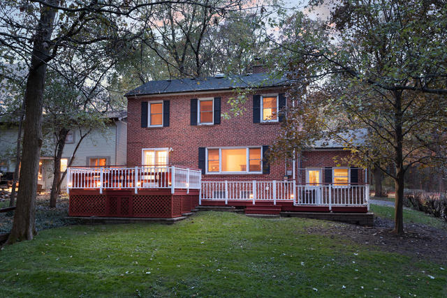 S477 Winfield Road Winfield, IL 60190 - Photo 2 of 29 a view of house with backyard space and balcony