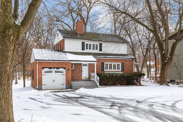 S477 Winfield Road Winfield, IL 60190 - Photo 24 of 29 a front view of a house with a yard
