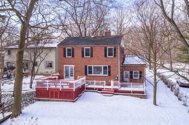 S477 Winfield Road Winfield, IL 60190 - Photo 29 of 29 a front view of a house with a yard and garage