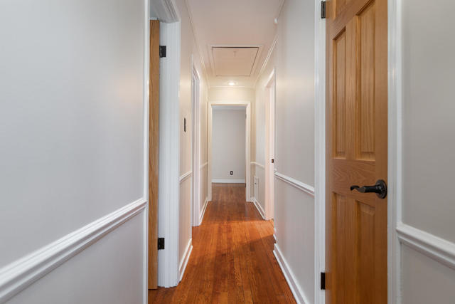 S477 Winfield Road Winfield, IL 60190 - Photo 10 of 29 a view of a hallway with wooden floor