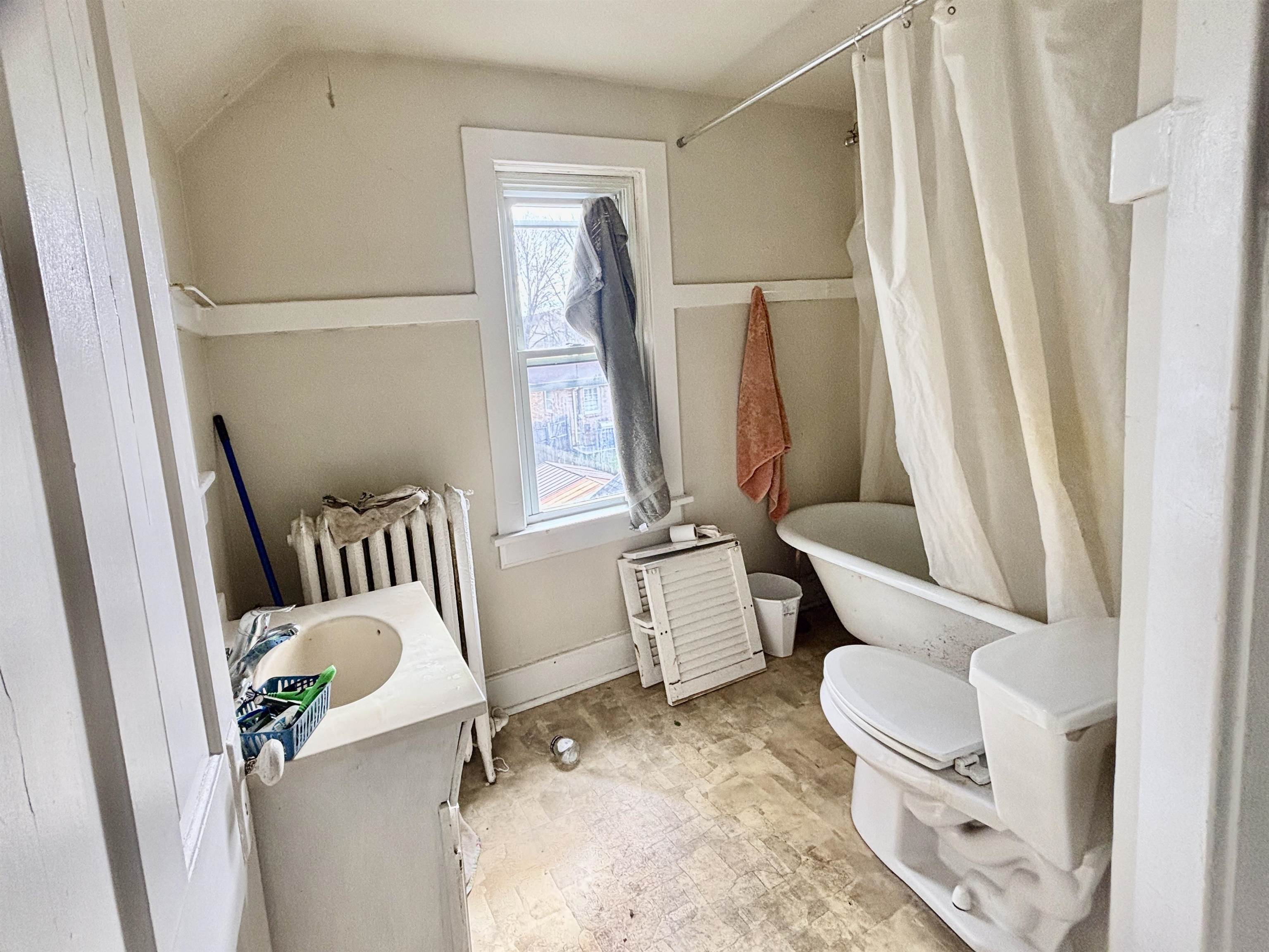 1016 South Main Street Belvidere, IL 61008 - Photo 7 of 17 a bathroom with a sink toilet and shower