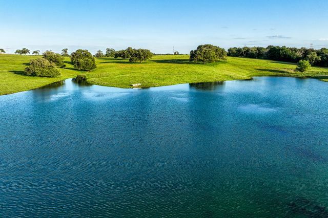 a view of a swimming pool with an outdoor space