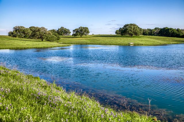 a view of an ocean and city