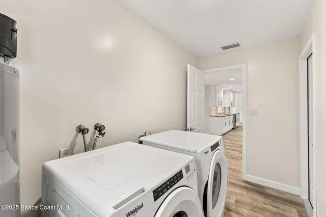 a view of a backyard with a swimming pool