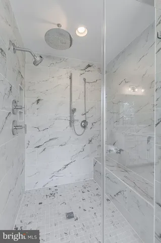 a view of a room with shelf on the wall