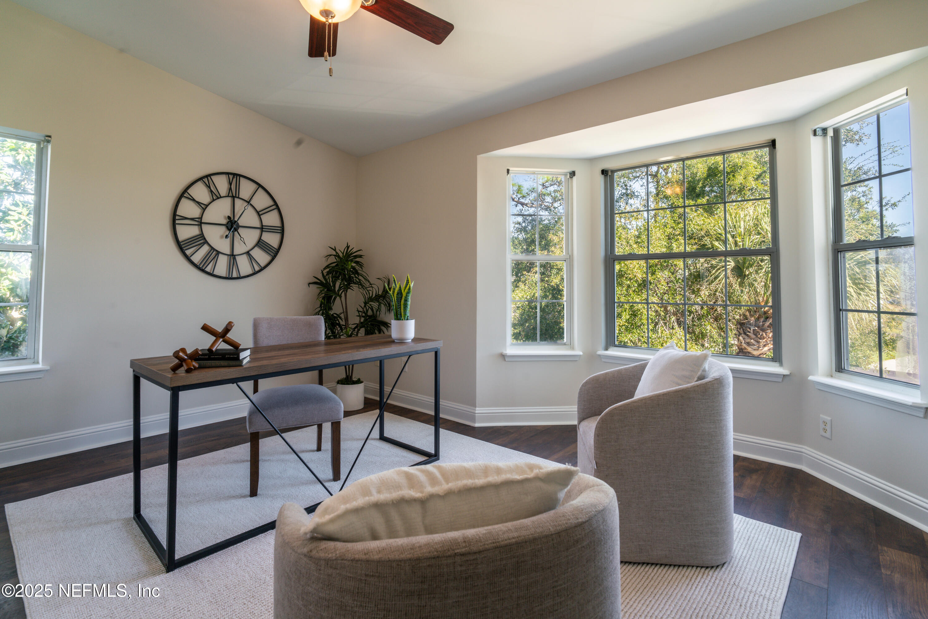3360 Lighthouse Point Lane Jacksonville, FL 32250 - Photo 13 of 65 a living room with furniture and a window