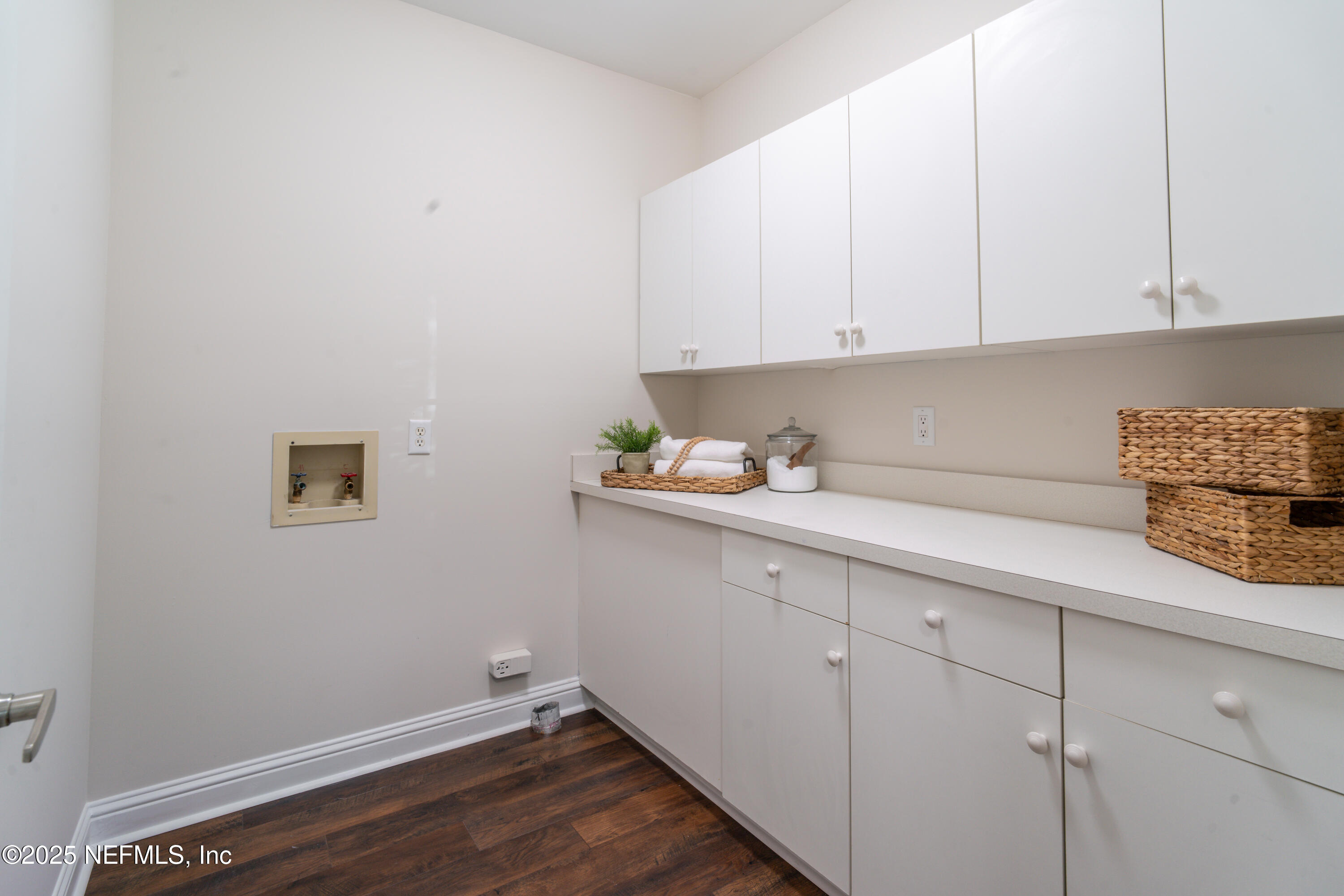 3360 Lighthouse Point Lane Jacksonville, FL 32250 - Photo 28 of 65 a room with storage and utility