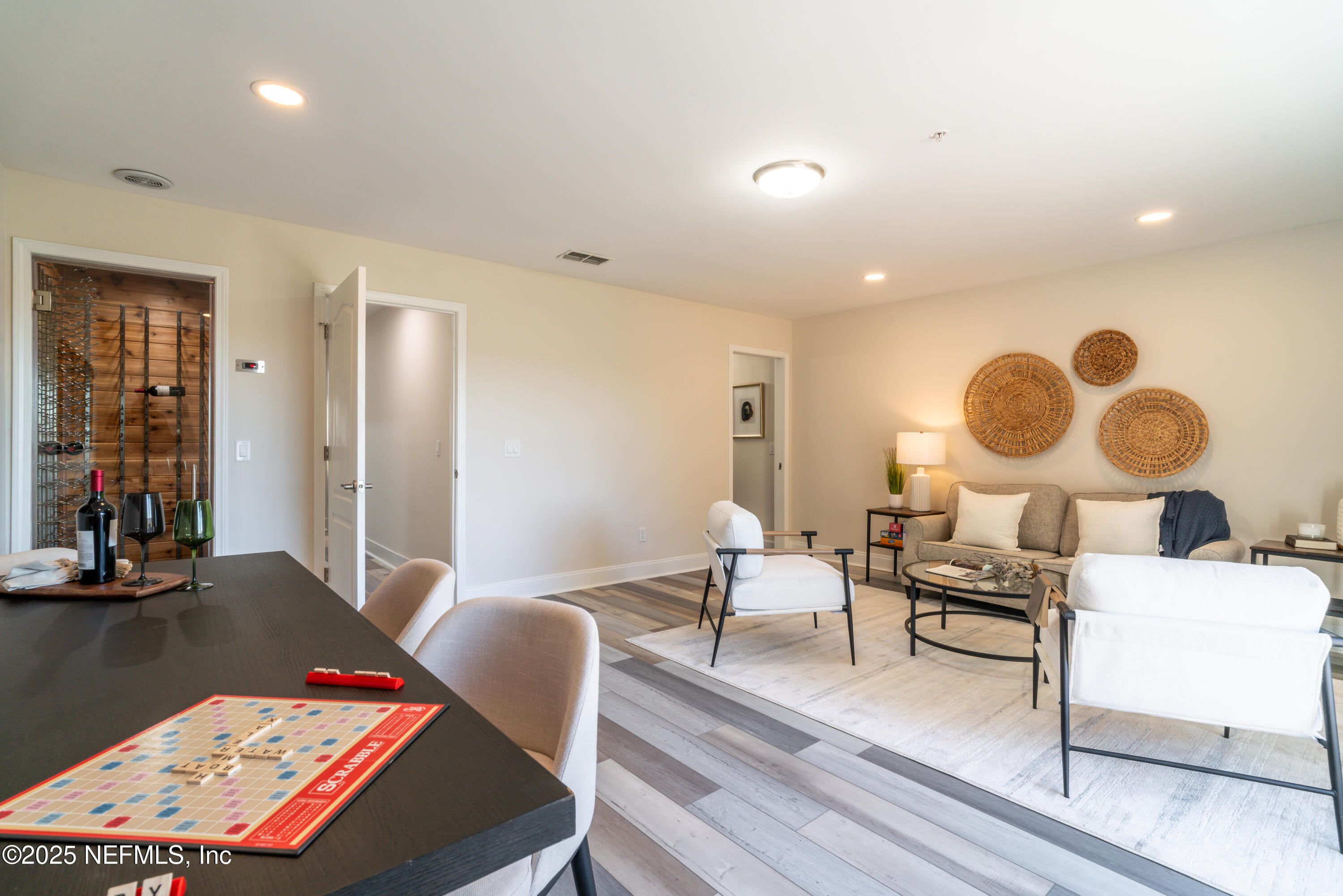 3360 Lighthouse Point Lane Jacksonville, FL 32250 - Photo 34 of 65 a living room with furniture and a rug