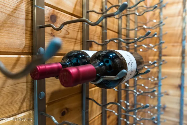 a room with a rug and a window