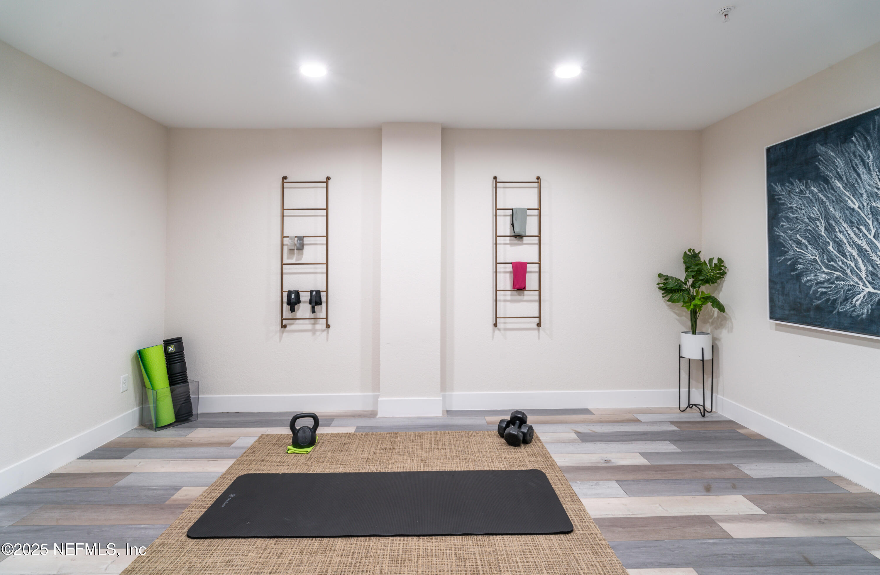 3360 Lighthouse Point Lane Jacksonville, FL 32250 - Photo 45 of 65 a bathroom with a bathtub a sink and a potted plant