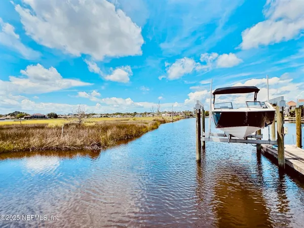 a view of a lake with a mountain