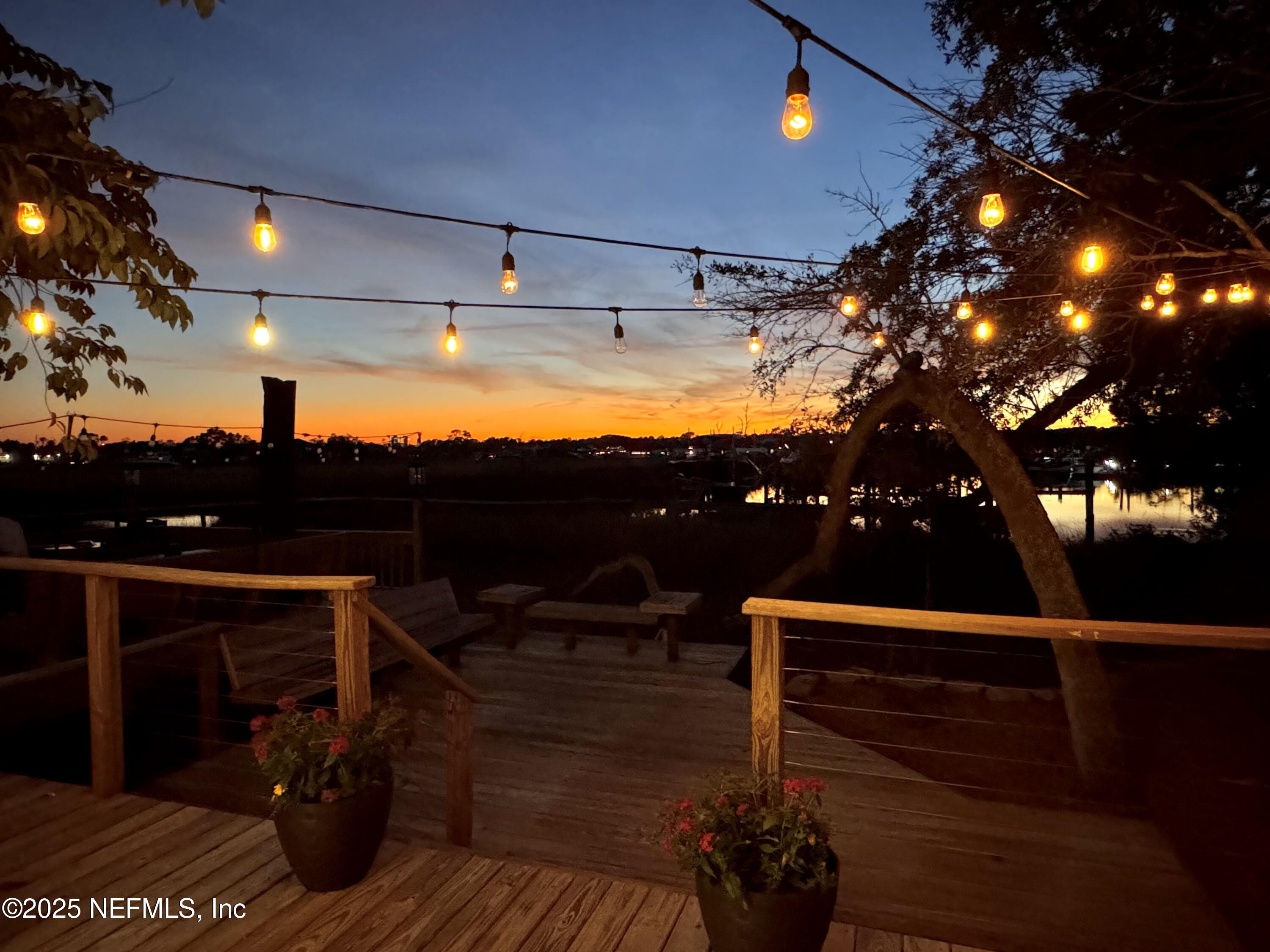 3360 Lighthouse Point Lane Jacksonville, FL 32250 - Photo 59 of 65 a view of balcony with furniture and lamp