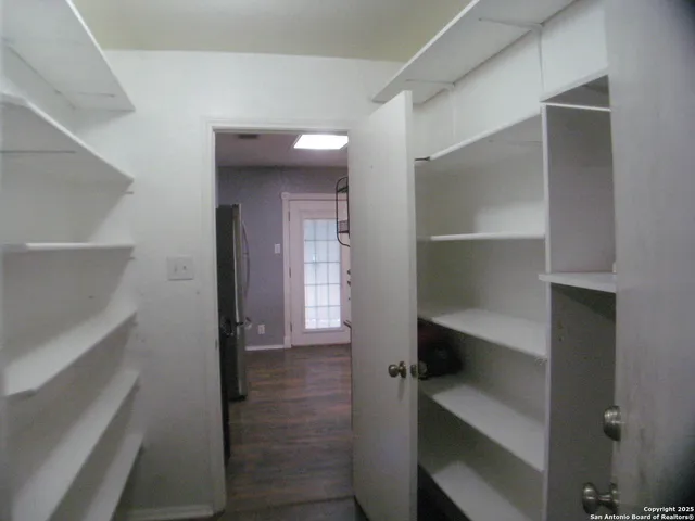 a view of an empty walk in closet