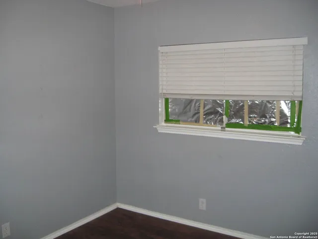 an empty room with a window