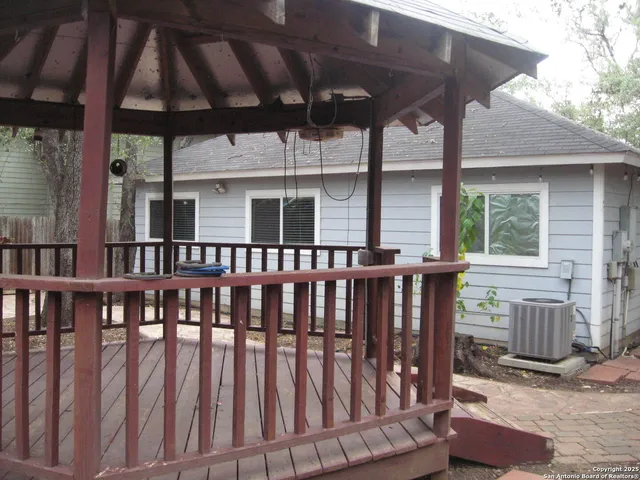 a view of a house with porch and wooden floor