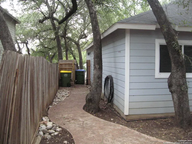 a view of a back yard of the house