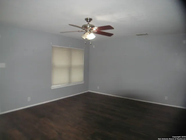 a view of a livingroom with a fan