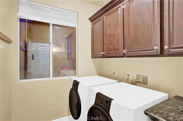 a bedroom with a bed and a table in it