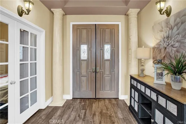 a view of livingroom with furniture and wooden floor