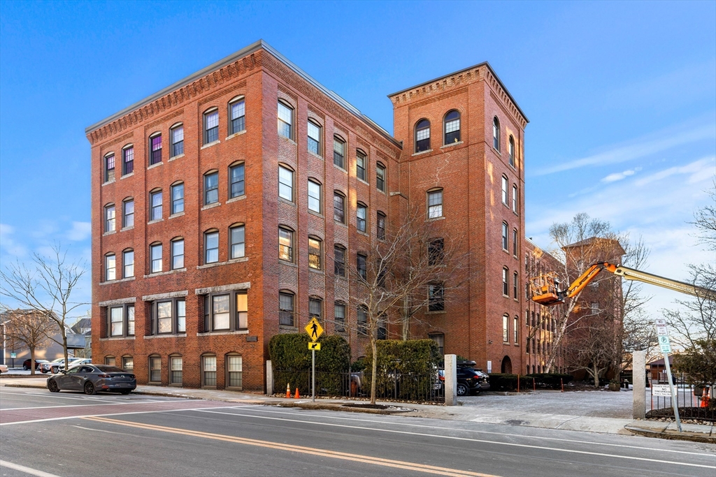 a front view of a building with street view