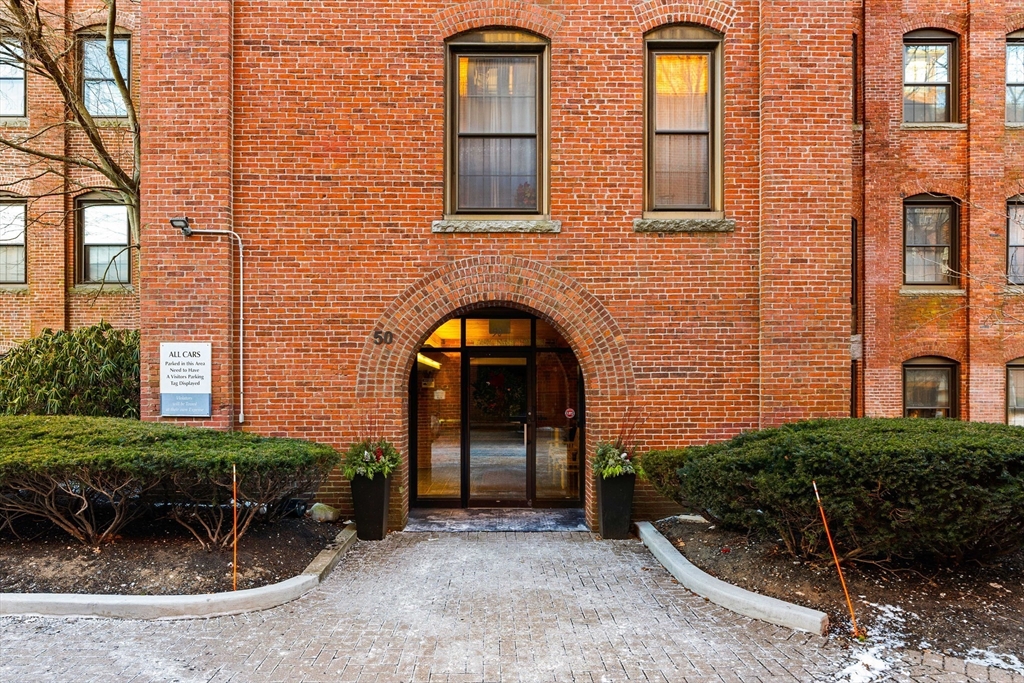 50 Rantoul Street, Unit 505 Beverly, MA 01915 - Photo 24 of 30 a front view of a house