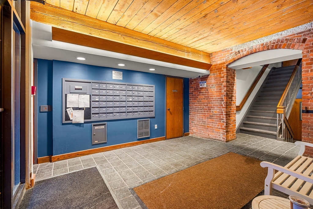 50 Rantoul Street, Unit 505 Beverly, MA 01915 - Photo 25 of 30 a front view of a house with stairs