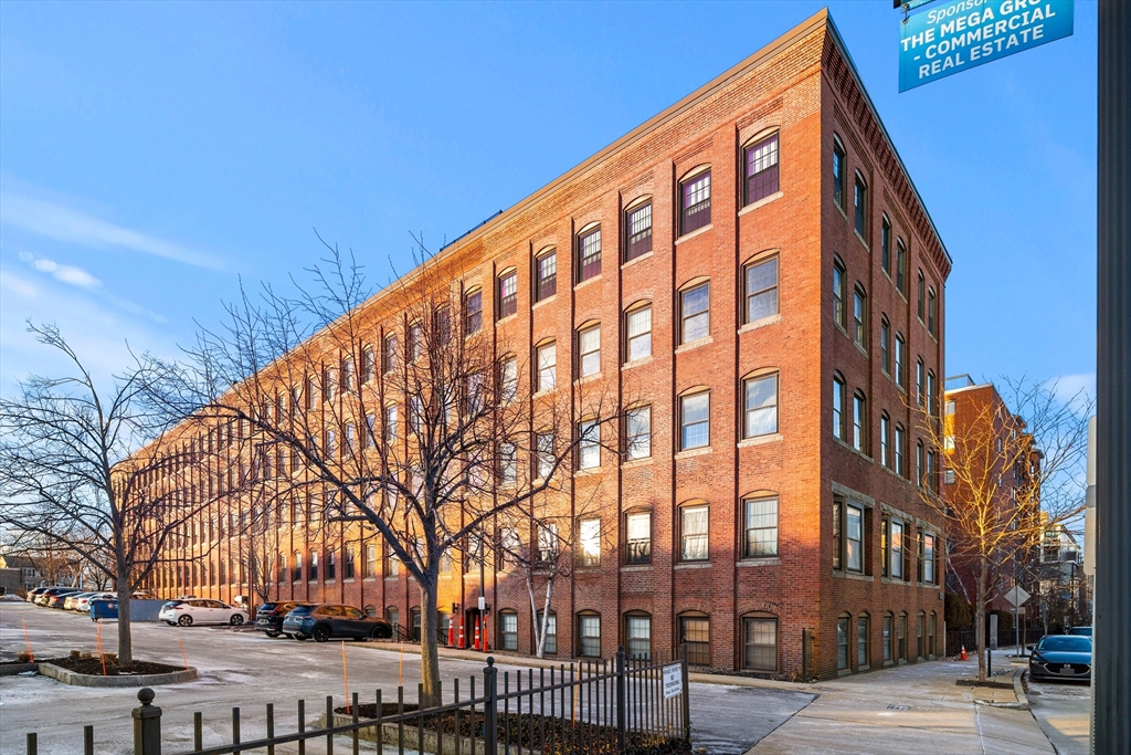 50 Rantoul Street, Unit 505 Beverly, MA 01915 - Photo 27 of 30 a view of a building with a snow