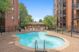 50 Rantoul Street, Unit 505 Beverly, MA 01915 - Photo 28 of 30 a swimming pool with outdoor seating and yard