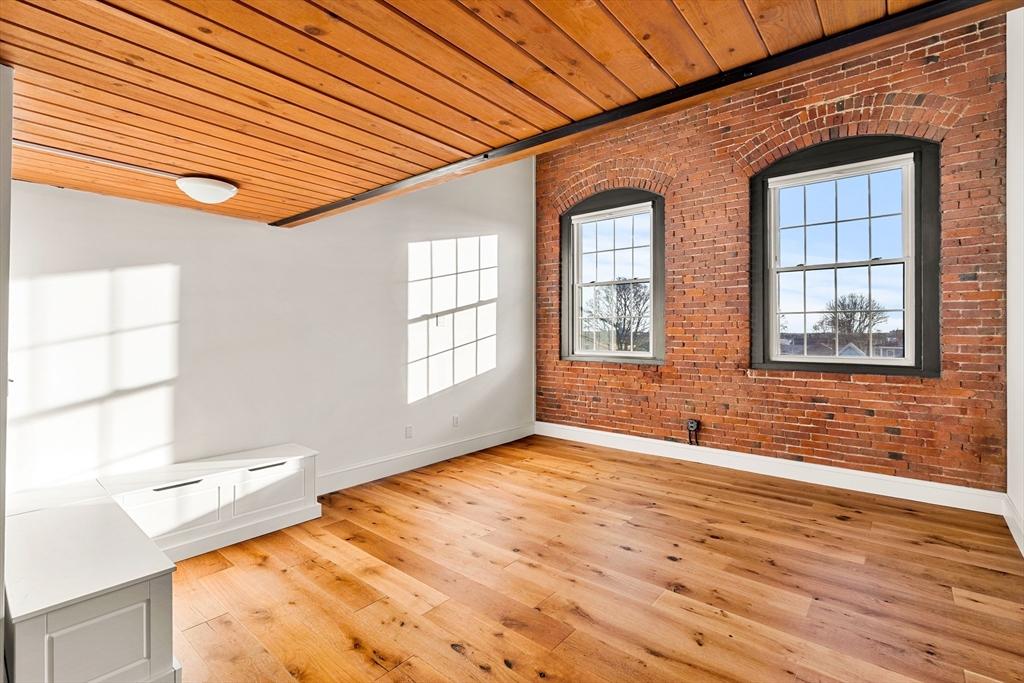 50 Rantoul Street, Unit 505 Beverly, MA 01915 - Photo 5 of 30 a view of an empty room with a window